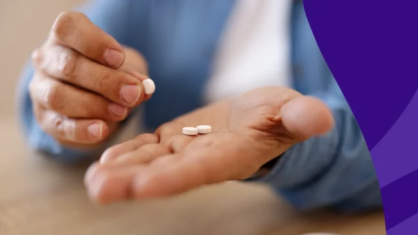 Hands holding pills - glp1-pills
