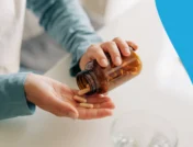 A man taking vitamins | Vitamins to avoid with diverticulitis