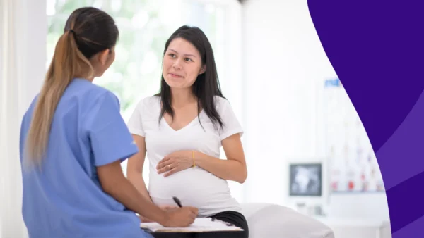 pregnant woman talking to a provider - Can you take Xanax while pregnant?