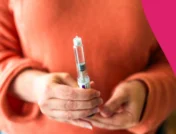 person holding a Mounjaro pen—Is Mounjaro safe?