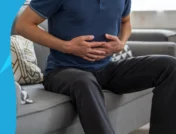 person holding their stomach - does amoxicillin cause constipation