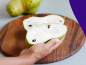 Image of a soursop cut in half - soursop benefits