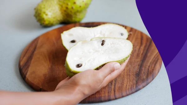 Image of a soursop cut in half - soursop benefits