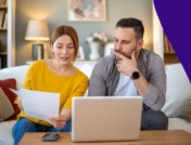 A couple comparing prescription discount programs