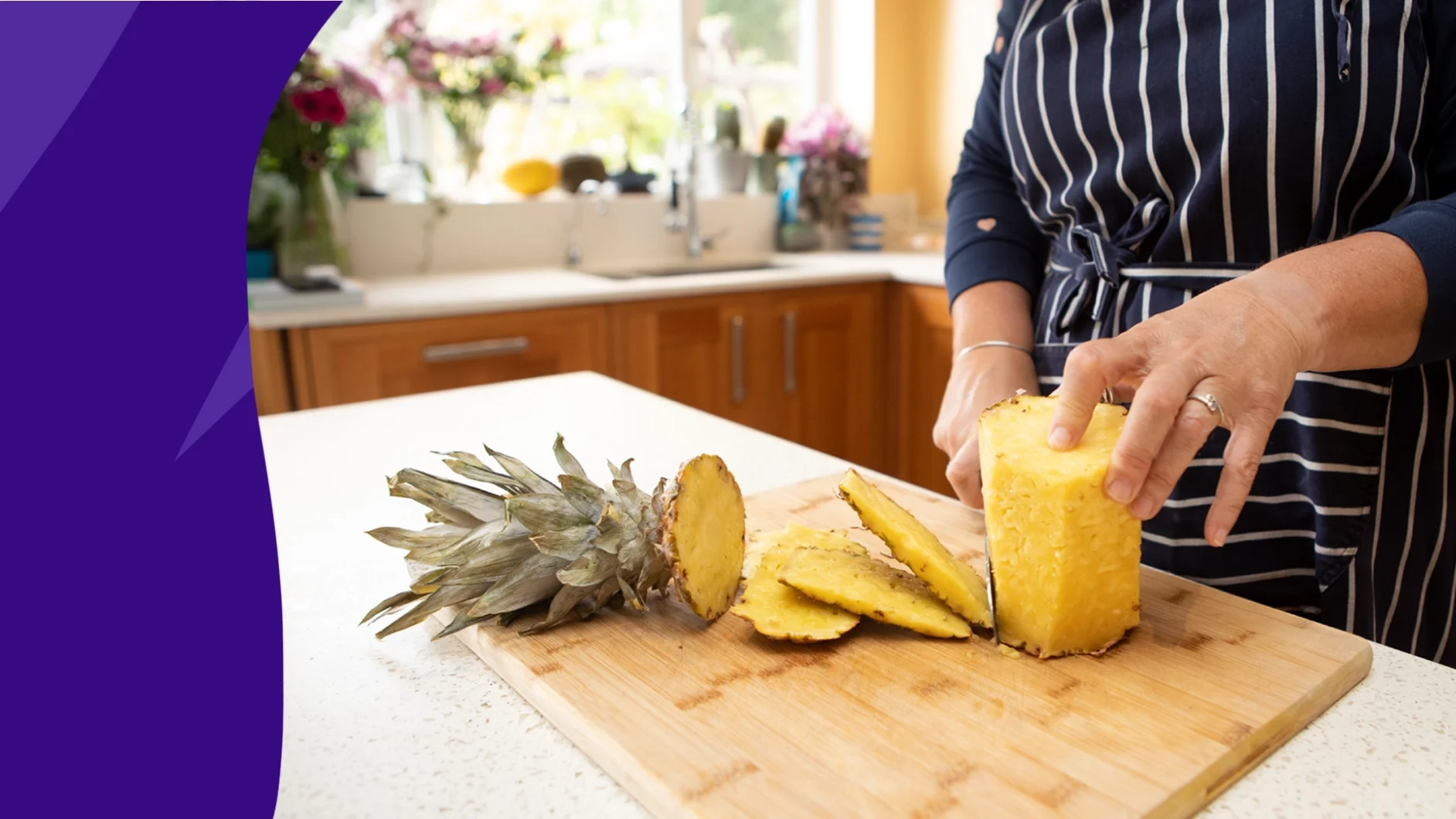 A person chopping pineapple | Pineapple benefits