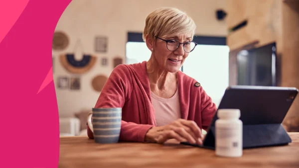 A woman drinking coffee with a pill bottle nearby | How long after taking ciprofloxacin can I drink coffee?