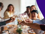 A group of people clinking glasses | Zofran and alcohol