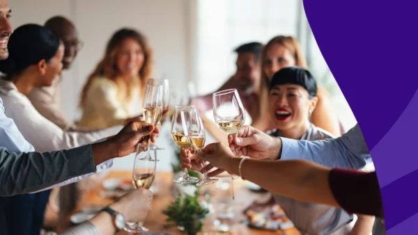 A group of people clinking glasses | Zofran and alcohol