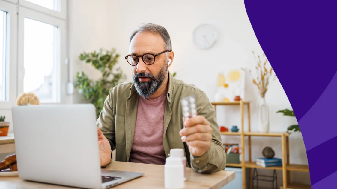 A man researching gabapentin for shingles on his laptop