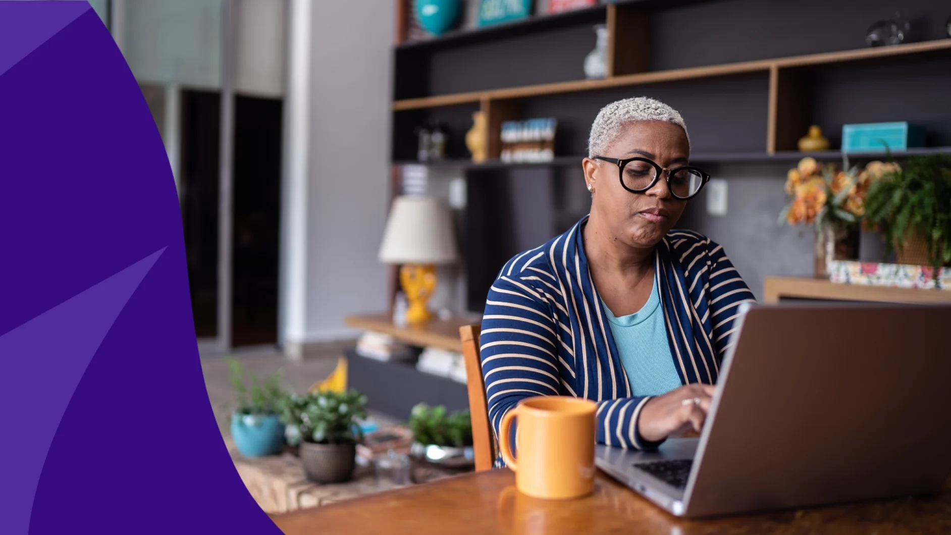 Person with glasses reading SingleCare reviews on a laptop - SingleCare reviews