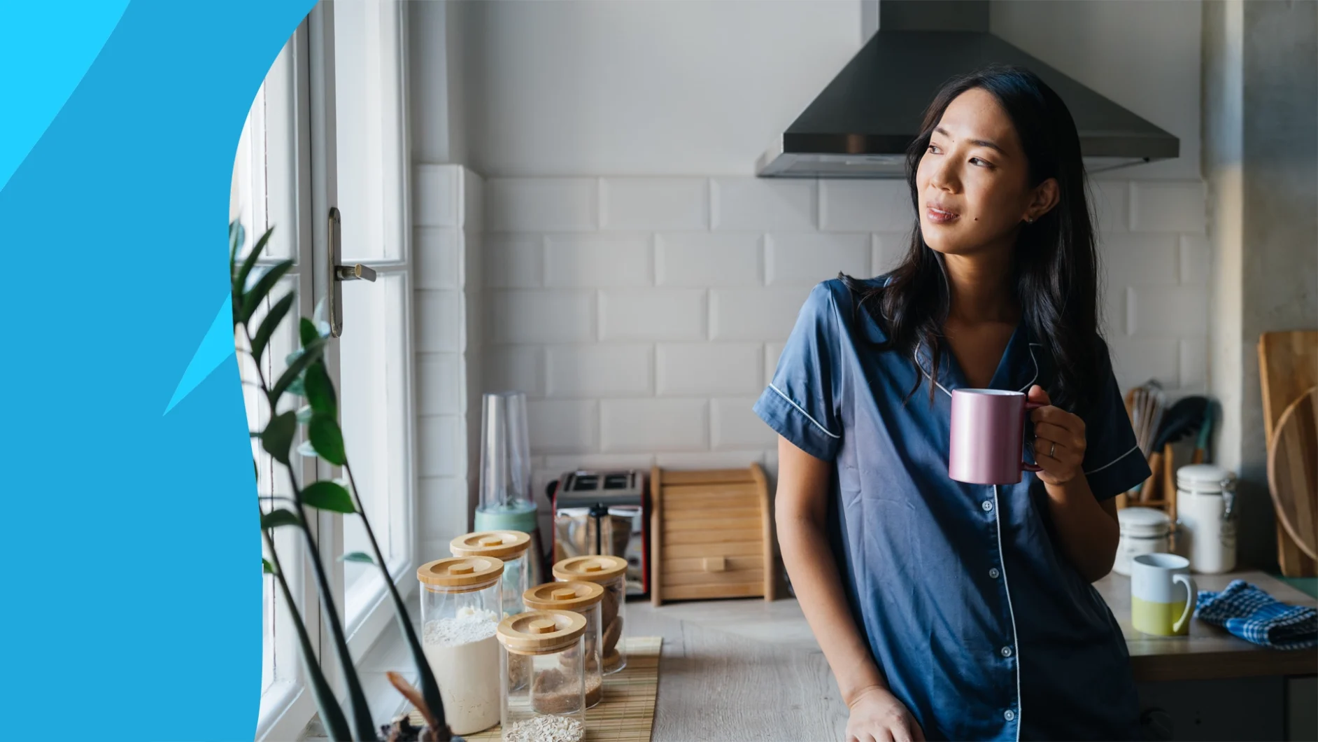 Woman holding a cup of coffee and smiling - Is coffee good for your kidneys