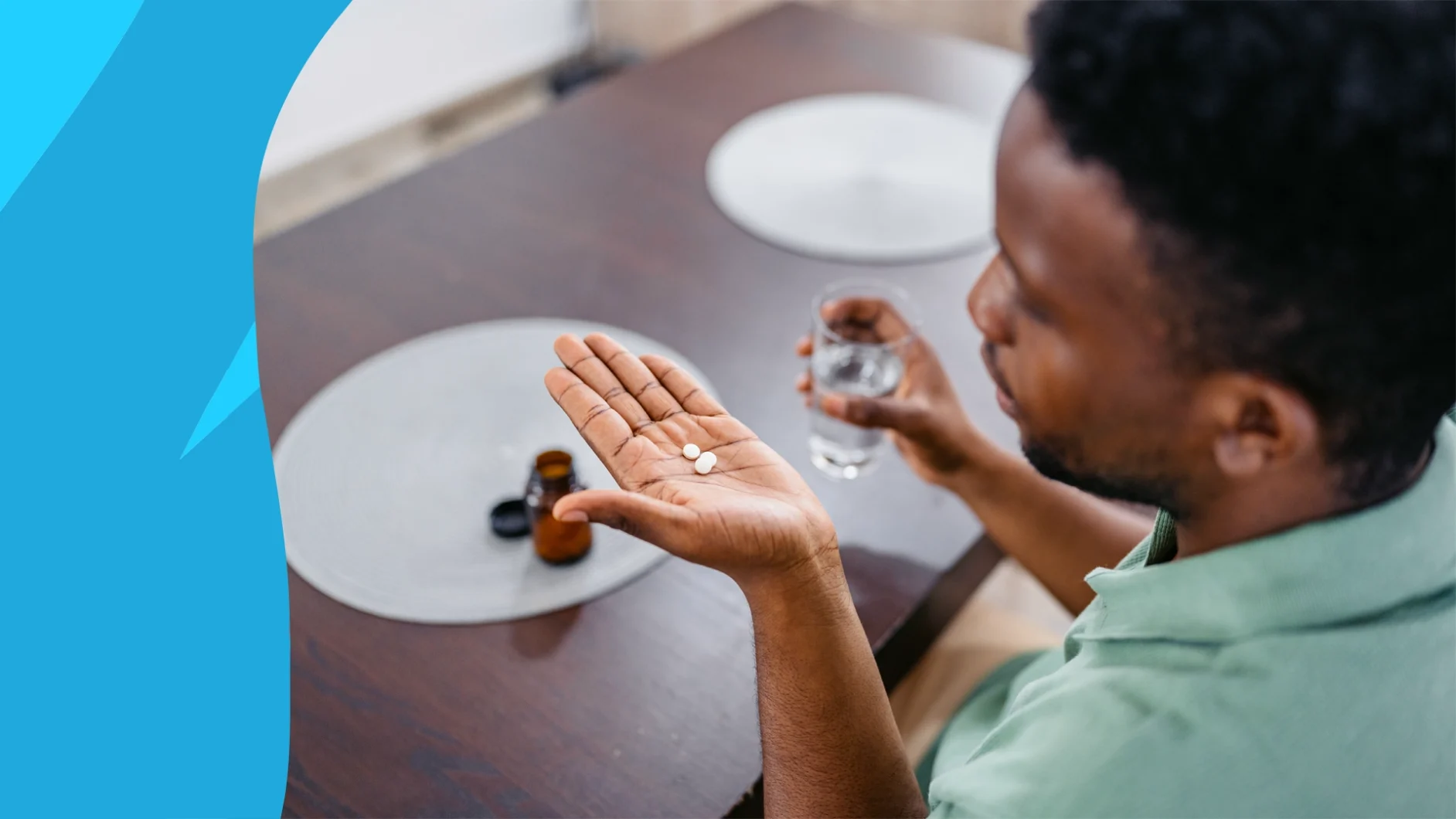 Man holding supplements in his hand to represent the best testosterone booster for erectile dysfunction