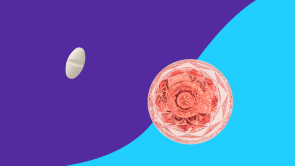 Image of a cocktail next to a tablet to represent meclizine interaction with alcohol