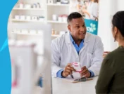 Imaged of a pharmacist consulting a patient to represent "Is Azelastine over the counter?"