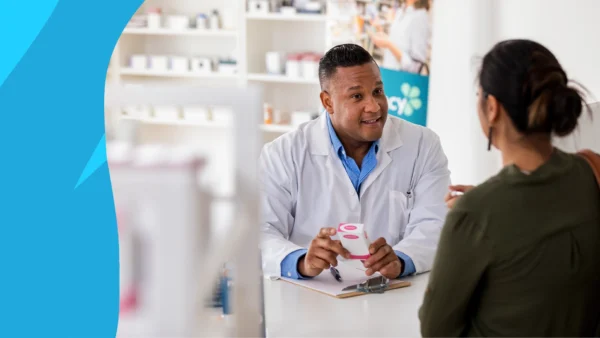 Imaged of a pharmacist consulting a patient to represent "Is Azelastine over the counter?"