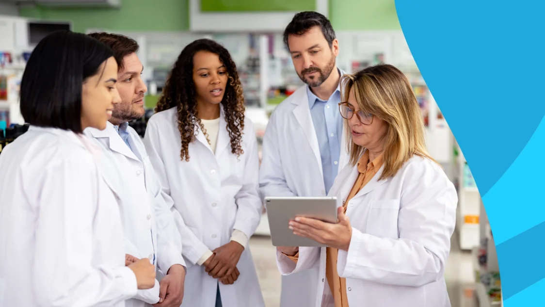 Image of a group of pharmacists speaking to represent the pharmacist's role in sepsis prevention